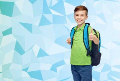 happy-student-boy-school-bag-childhood-education-people-concept-smiling-over-blue-low-poly-texture-background-69351195-transformed